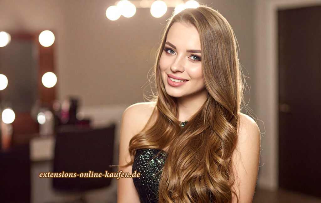 Frau mit glänzenden, gestylten Remy Echthaar Extensions in einem Salon – Werbung für hochwertige Haarverlängerungen bei extensions-online-kaufen.de